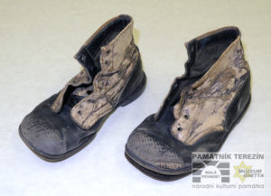 Children´s shoes worn in the Terezín Ghetto by Petr Dadák (born in 1942). He was deported to Terezín from Ostrava in March 1945 in a transport AE 6. He stayed in Terezín with his mother until the ghetto´s liberation, Terezin Memorial, PT 14298.